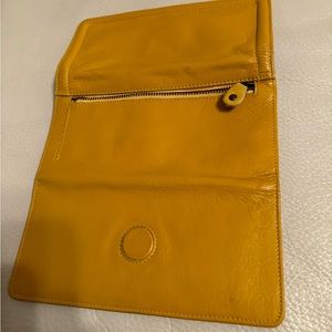 Nice leather mustard color wallet fits all your cc and cash